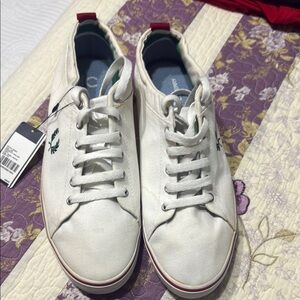 White Sneakers with Red Accents